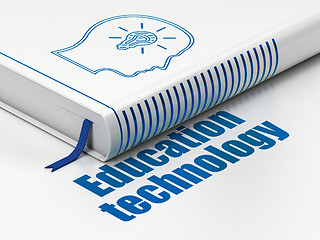 Image showing Education concept: book Head With Lightbulb, Education Technology on white background