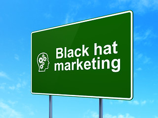 Image showing Business concept: Black Hat Marketing and Head With Gears on road sign background