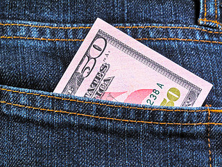 Image showing Fifty dollars in jeans pocket