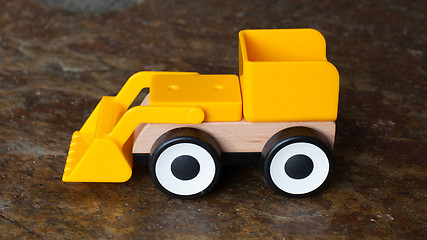 Image showing Simple wheel dozer toy