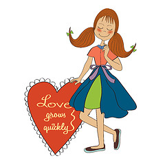 Image showing Girl in love holding a heart