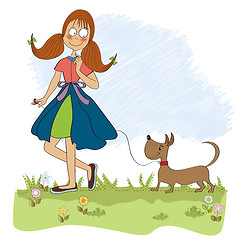 Image showing Girl walking her little dog