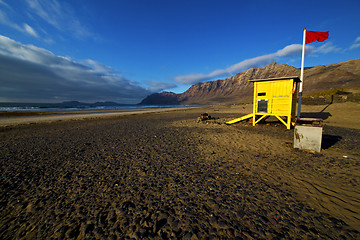 Image showing lifeguard chair red flag in spain  lanzarote  rock stone sky clo