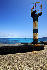 Image showing lighthouse and pier  in the lanzarote spain