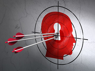 Image showing Information concept: arrows in Head With Keyhole target on wall background