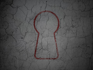 Image showing Security concept: Keyhole on grunge wall background