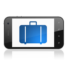 Image showing Tourism concept: Bag on smartphone