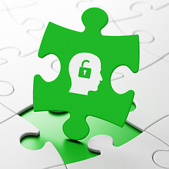 Image showing Finance concept: Head With Padlock on puzzle background