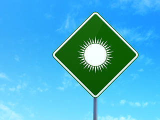 Image showing Travel concept: Sun on road sign background