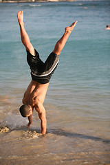Image showing Handstand on the beach