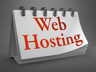 Image showing Web Hosting - Red Word on Desktop Calendar.