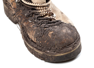 Image showing Part of old dirty hiking boot on white background