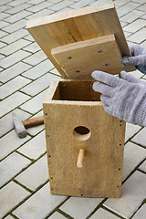 Image showing Making a birdhouse from boards spring season