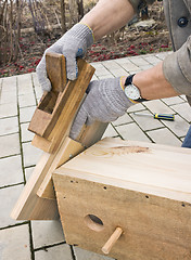Image showing Making a birdhouse from boards