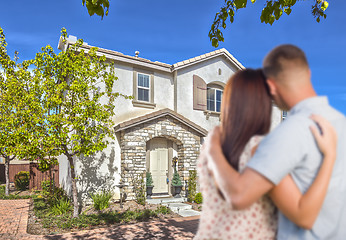 Image showing Military Couple Looking at Nice New House