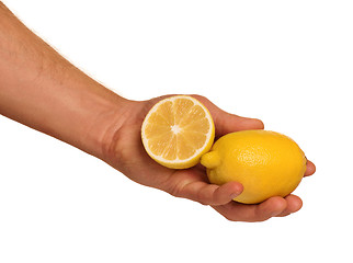 Image showing Hand with lemon