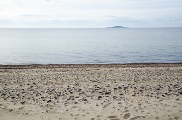 Image showing View at an island from a sandy beach