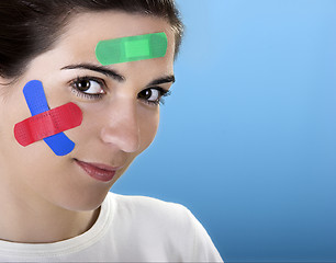 Image showing Woman with bandages on the face