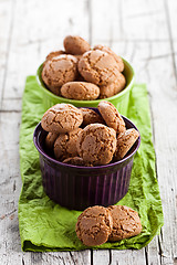 Image showing meringue almond cookies in bowls 