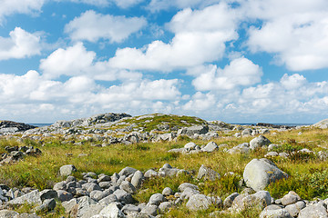 Image showing Stony landscape with blue sky with white clouds.