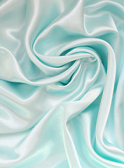 Image showing Smooth elegant blue silk as background 