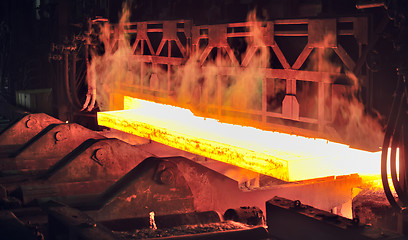 Image showing hot steel on conveyor