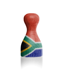 Image showing Wooden pawn with a flag painting