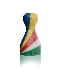 Image showing Wooden pawn with a flag painting