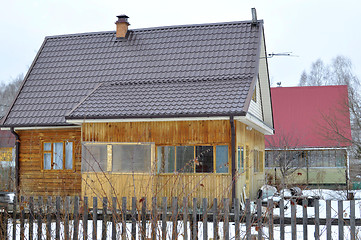 Image showing The wooden house in a housing estate.