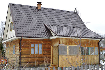 Image showing The wooden house in a housing estate.