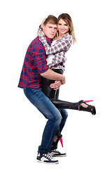 Image showing Cheerful pair posing in casual clothes