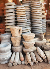 Image showing Pile of stone ware for sale. Open Market in Myanmar