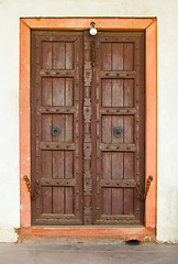 Image showing Old wooden door on a building facade. India, Agra