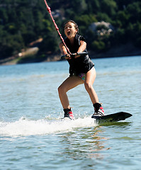 Image showing Girl wakeboarding