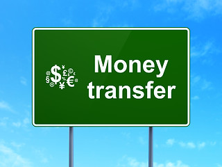 Image showing Business concept: Money Transfer and Finance Symbol on road sign background