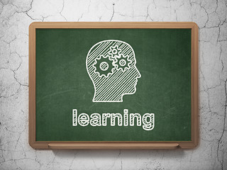 Image showing Education concept: Head With Gears and Learning on chalkboard background