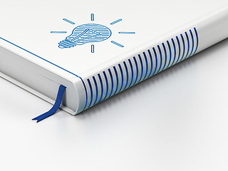 Image showing Business concept: closed book, Light Bulb on white background
