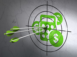 Image showing Business concept: arrows in Calculator target on wall background