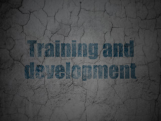 Image showing Education concept: Training and Development on grunge wall background