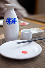 Image showing Japanese style table set and sake