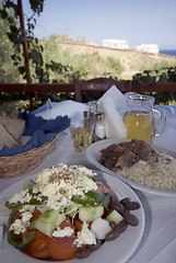 Image showing greek taverna lunch over sea view