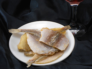 Image showing Sea bream fish on a white plate