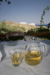 Image showing wine on table greek island view