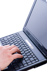 Image showing Male hand typing on laptop