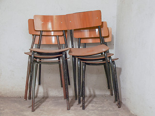 Image showing Piled chairs