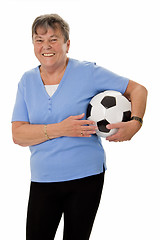 Image showing Senior woman with soccer ball