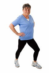 Image showing Senior woman doing stetching exercises