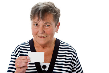Image showing Senior woman with businesscard