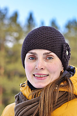 Image showing woman in yellow jacket in nature