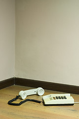 Image showing Telephone at the corner of a room

